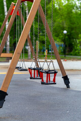 empty children's swing in the park