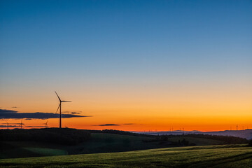 wind turbines at sunrise