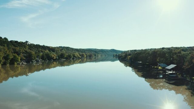 Reflective water of Lake Travis in Austin