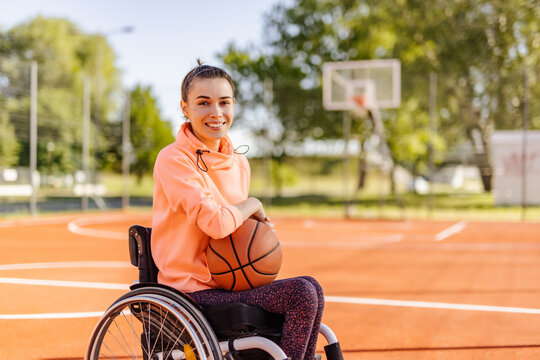 Disabled basketball player, young girl.