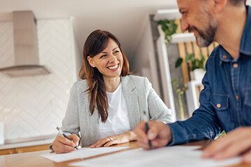Bearded man talking to his business partner.
