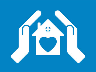 Home care, insurance concept. Hands cover the roof of the house.