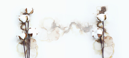 Creative image of beautiful cotton flowers on artistic ink background.