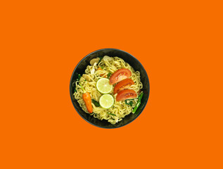 Indonesian Mie Goreng Nyemek or Fried Noodle with egg traditional Indonesian or Chinese food with mustard greens
