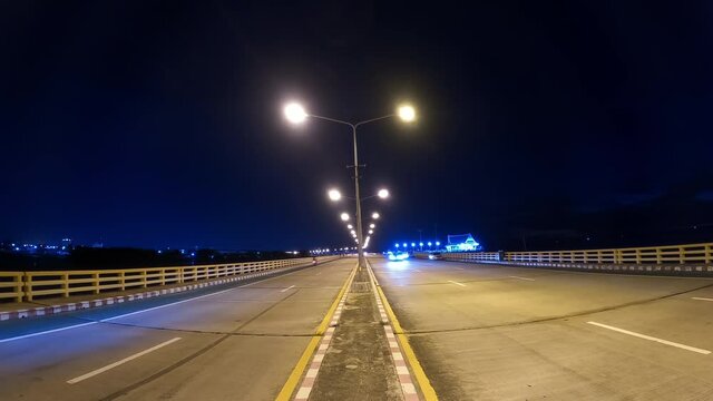 Long explosure of street light and vehicle run at night, transportation at nigth scene 