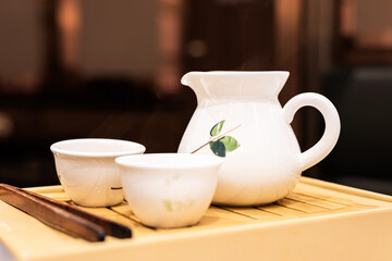 Chinese teapots and cups on the dining table