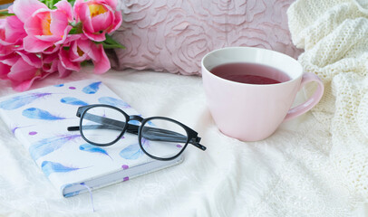 Cozy composition. Concept: Working from home, surprise in bed