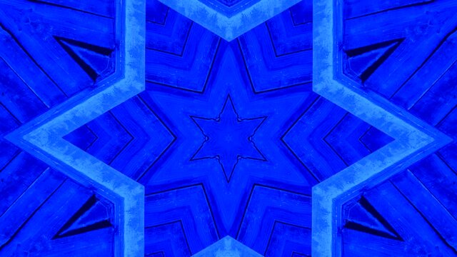 A star hidden in a Blue Kaleidoscope; spinning in an abstract formation.