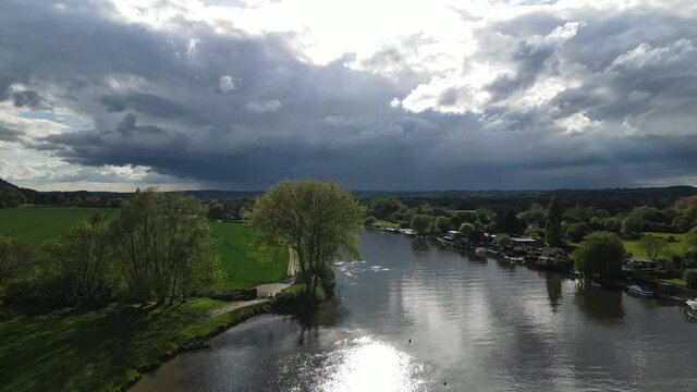 River Thames at Bourne End  sun shining off water  UK Buckinghamshire Aerial footage