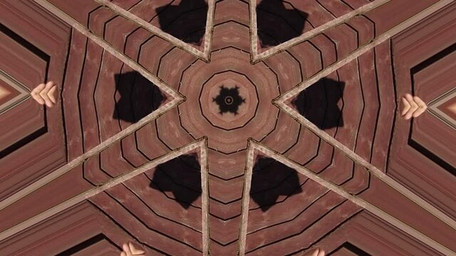 A trippy pattern spinning in a abstract brown Kaleidoscope.