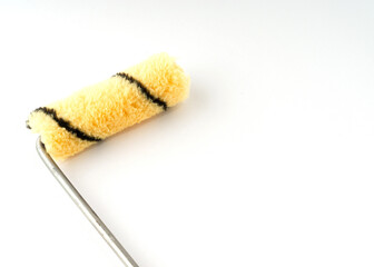 Small roller brush isolated on white background.