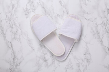 Slippers on marble background. Top view