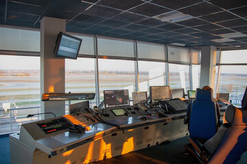 Dispatcher background. The workplace of the traffic manager at the airport at the tower. Chair,...