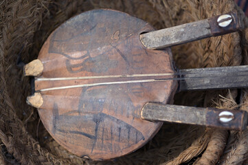 A historical plucking instrument on a flea market in Spain.