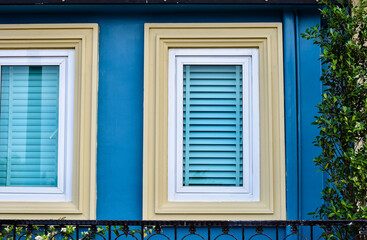 vintage windows on the blue wall