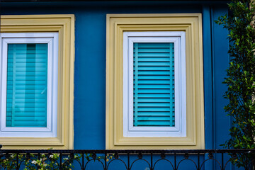 vintage windows on the blue wall