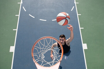 Basketball street player with basketball ball outdoor.