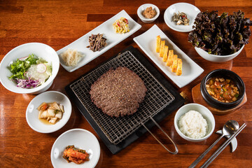 with rolled omelette ,kimchi, salad , tofu soup and rice 
