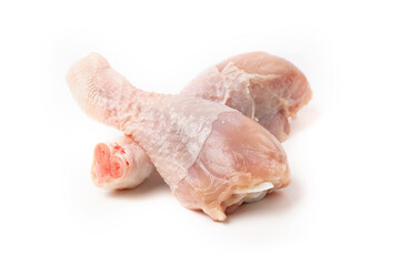 Raw chicken drumsticks, isolated on white background.