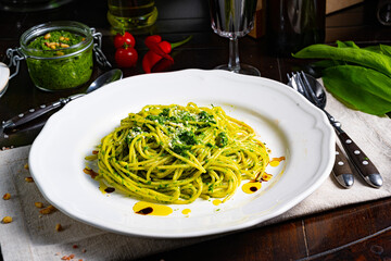 Pasta with wild garlic pesto and pine nuts