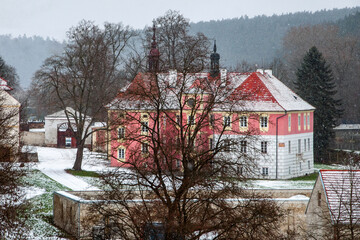 Snowy baroque castle Mitrowicz.