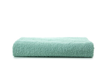 Green folded towel isolated on white background