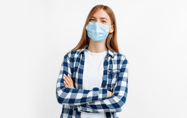 young woman in a medical mask, close-up of a young woman with a surgical mask on her face from...