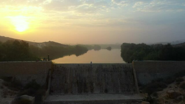 Aerial Shot Of Idyllic Lake Against Sky During Sunset, Drone Flying Forward Over Water - Jericho, Israel