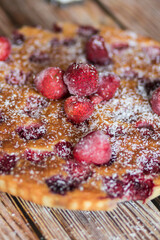 Homemade strawberry cake. Stot on the kitchen table.