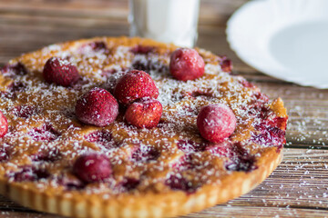 Homemade strawberry cake. Stot on the kitchen table.