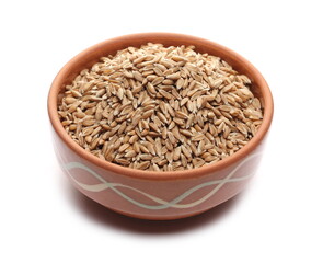 Spelt grains, seeds in clay bowl isolated on white background