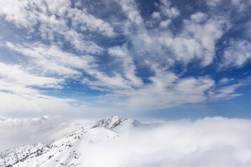 Mountains winter landscape low cloudy sunny day