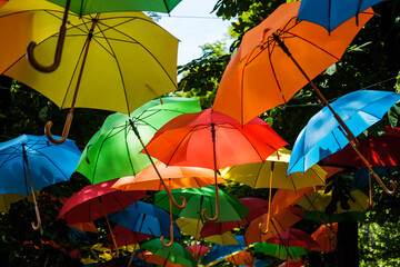 Fototapeta na wymiar colorful umbrellas in the park