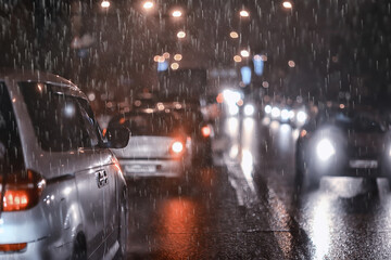 rain urban traffic cars, night view of the city, traffic flow of city lights abstract autumn background