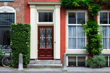 Fototapeta na wymiar Door and window of an old house in Netherlands