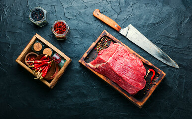 Raw veal meat with seasoning