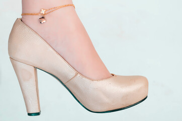 WOMAN'S SHOE WITH JEWELED ANKLE HEEL