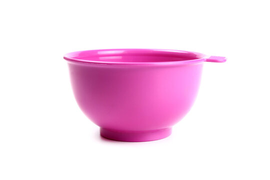Pink plastic hair dye bowl isolated on white