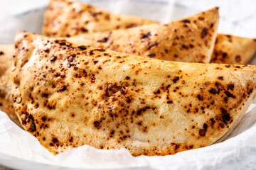 Traditional Chilean empanadas in a basket. Close up