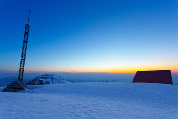 Meteo station in the winter sunset in the mountains