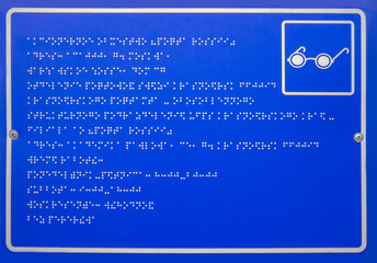 Table with lettering of braille for blind people. A tactile writing system for people with visual...