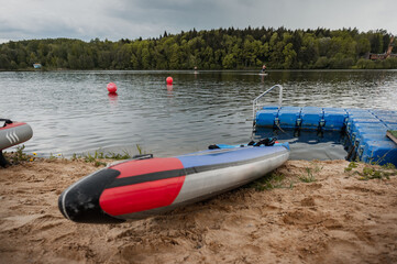 paddle board on the beach on the lake background