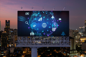 World planet Earth map hologram and social media icons on billboard over night panoramic city view of Bangkok, Southeast Asia. Networking and establishing new connections between people. Globe