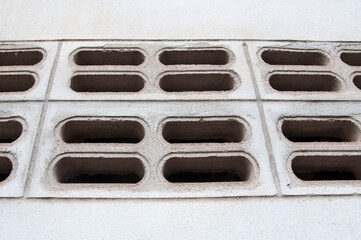 Air vents on cement walls, modern design.