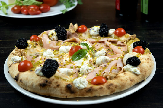 pizza gourmet con gelsi neri