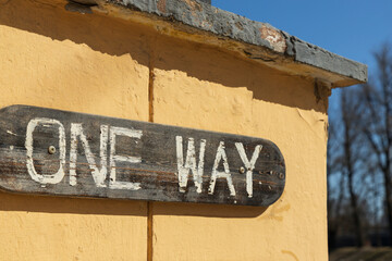 In the corner of the wall on the sign the inscription 'one way' not a trademark on the background...