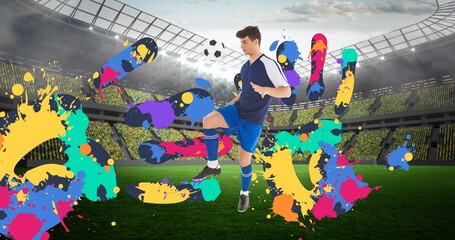 Composition of football player with ball over colourful handprints and sports stadium