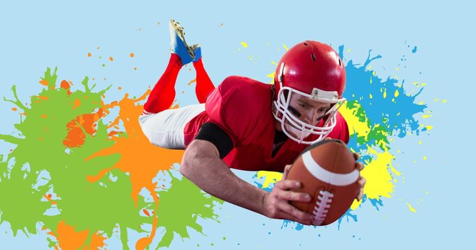 Composition of american football player over colourful splodges and blue background