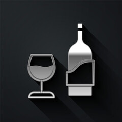 Silver Wine bottle with glass icon isolated on black background. Long shadow style. Vector