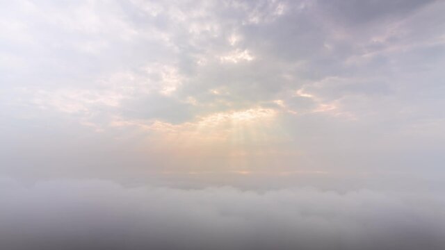 Timelapse clouds moving fast in during sunrise. view of fog flowing from the top of a mountain, Khao Phra Ya Dern Thong View Point Lopburi Thailand